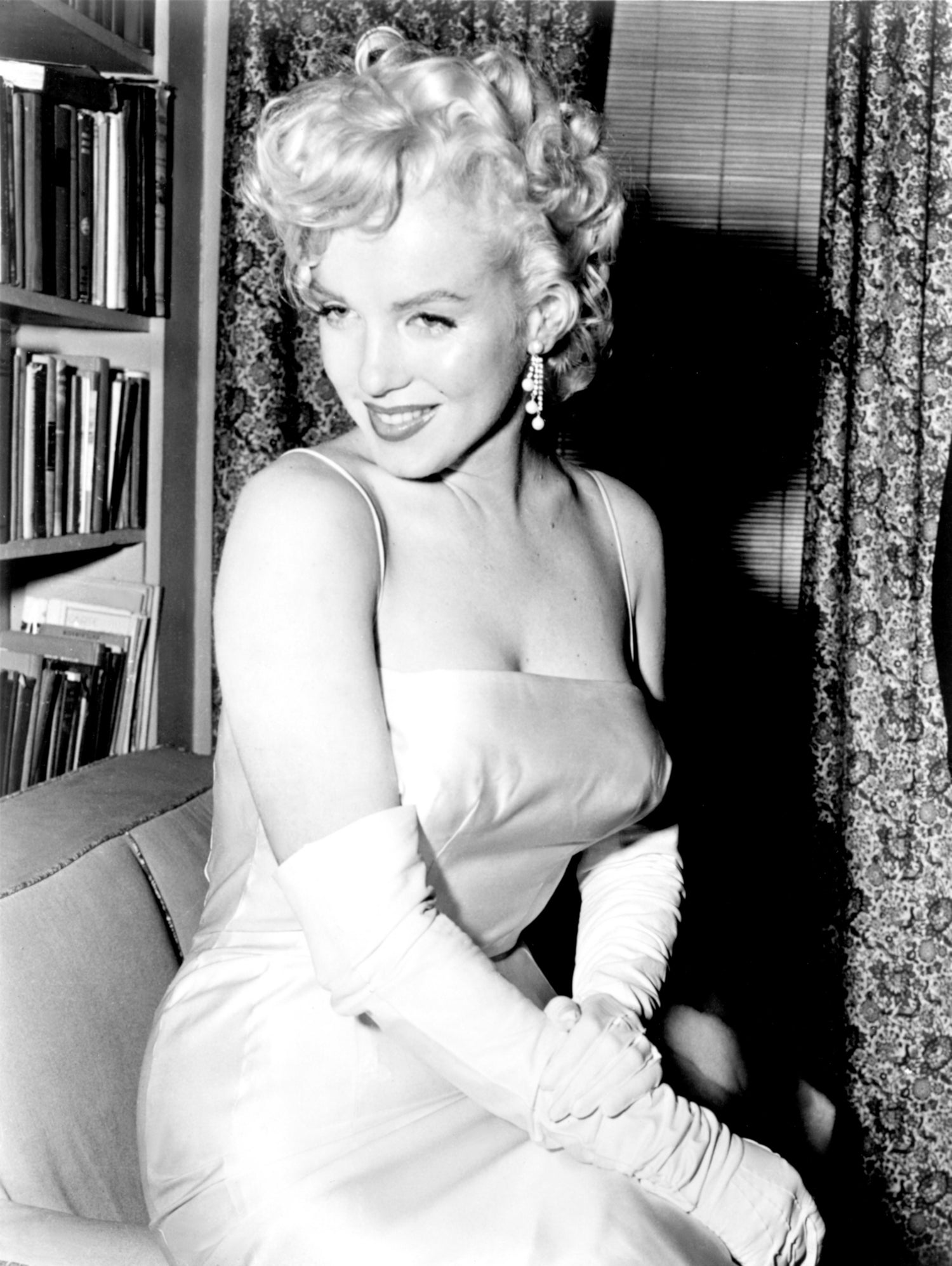 Marilyn Monroe during a party for the birth of the Marilyn Monroe Productions, 1955 by Bridgeman Images on GIANT ART - black and white photography