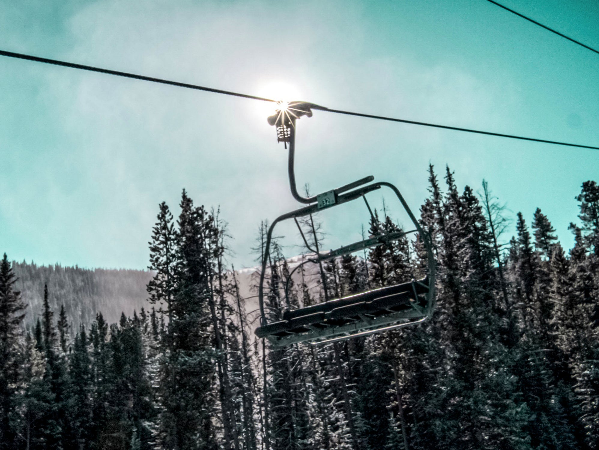 Chair Lift with Dark Blue and Teal Winter Sky by RJ Byrd on GIANT ART - blue photo illustration